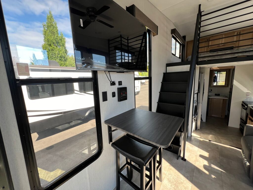 Camp Smarter, Not Harder: This 183 Square Feet RV’s Got A Porch & Loft, All In One!_10