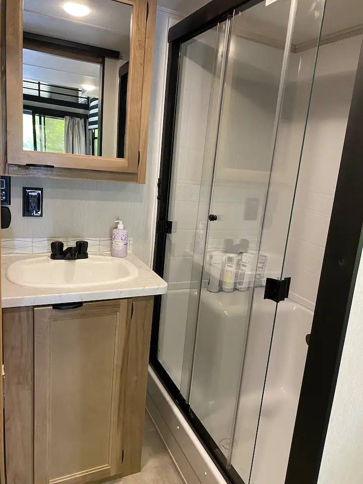 Camp Smarter, Not Harder: This 183 Square Feet RV’s Got A Porch & Loft, All In One!_11